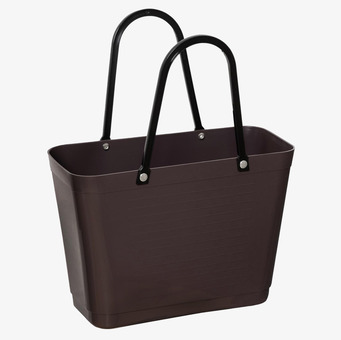 Foto av liten brun plastkasse med svarta handtag