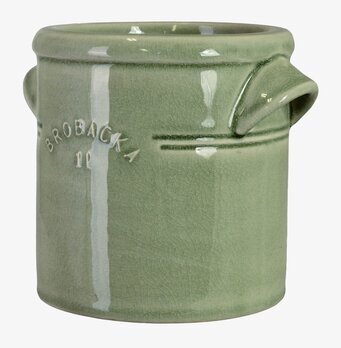 Foto: Ljusgrönt keramiskt krus med pip och krackelering