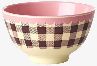Foto: Liten rutig skål med rosa insida och gul fotring