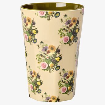 Foto: Blommig lattefärgad mugg med grön insida
