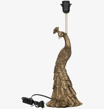 Foto: Lampfot påfågel i antikguld/brons mot vit bakgrund