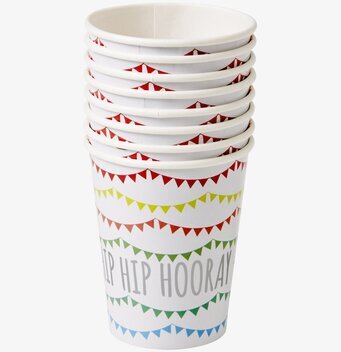 Muggar för kalas från Rice med färgglada vimplar och text