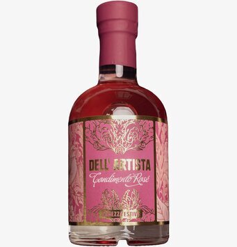 Foto av rosébalsamico i glasflaska med rosa etikett