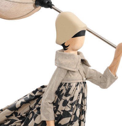 Foto på dekorativ figurlampa med textilskärm beige