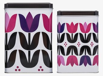 Bild av två plåtburkar med tulpanmotiv och svart lock
