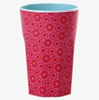 Bild av färgstark mugg med blommönster och turkos insida