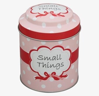 Bild av charmfull plåtburk med rosa och vita prickar