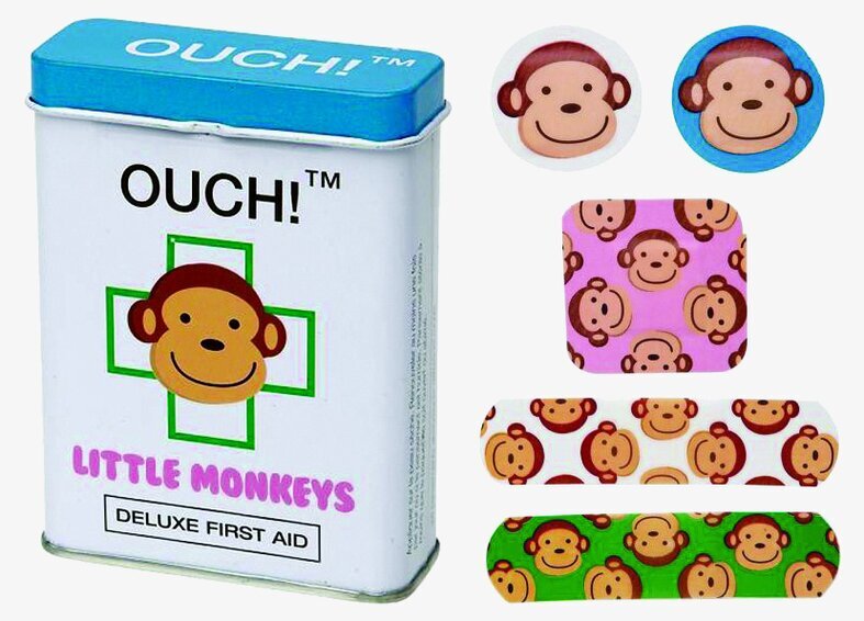 Plåster Apa från Ouch! i en blå och vit metallburk