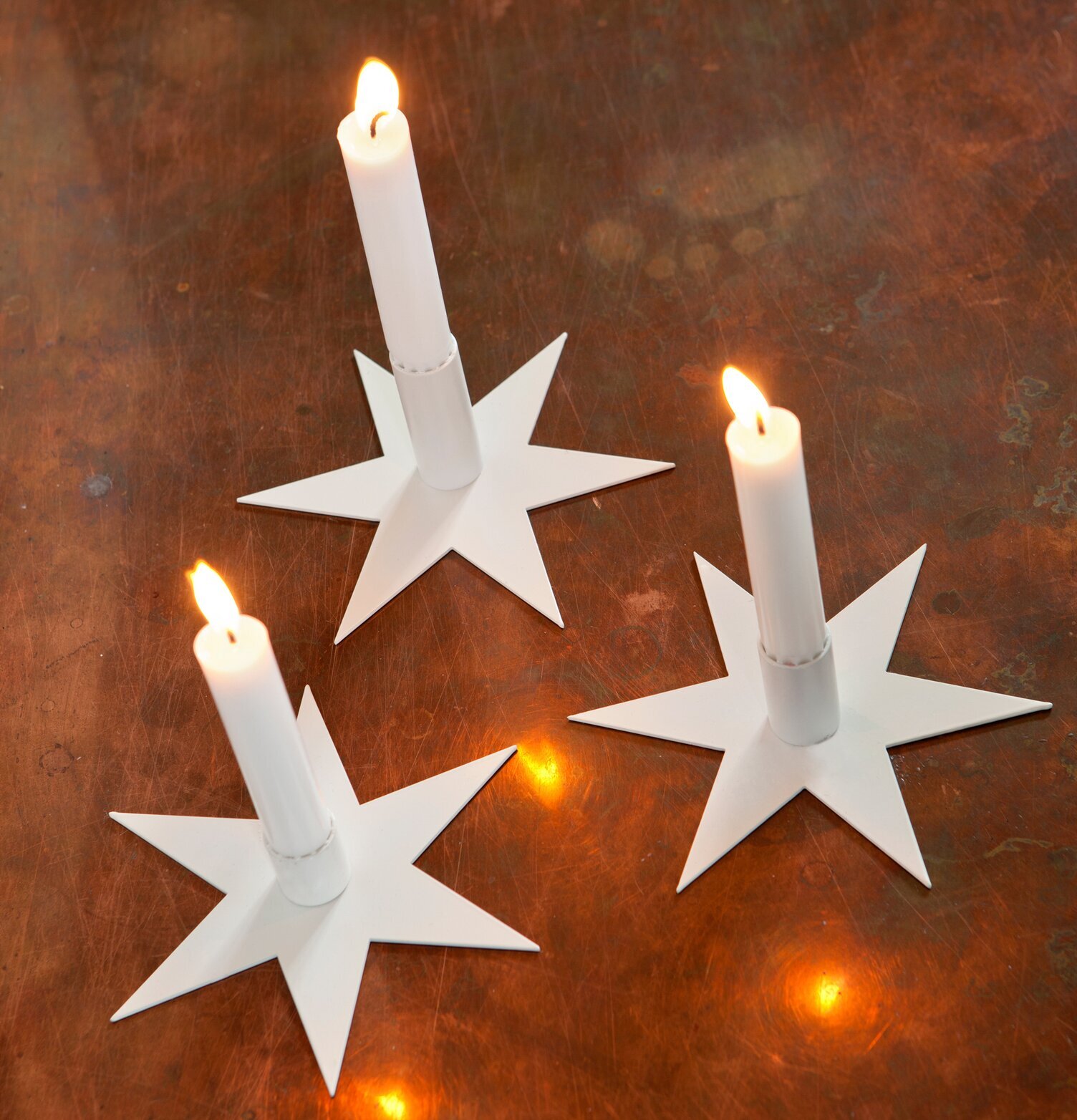 Stjärna Koppar 17 cm från Ernst på kopparfärgad yta