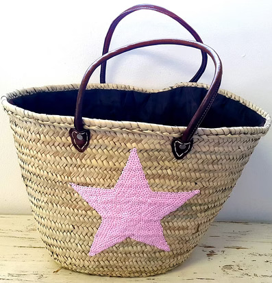 Stråväska Deco Pink Star från Nomadic Essentials på vit yta