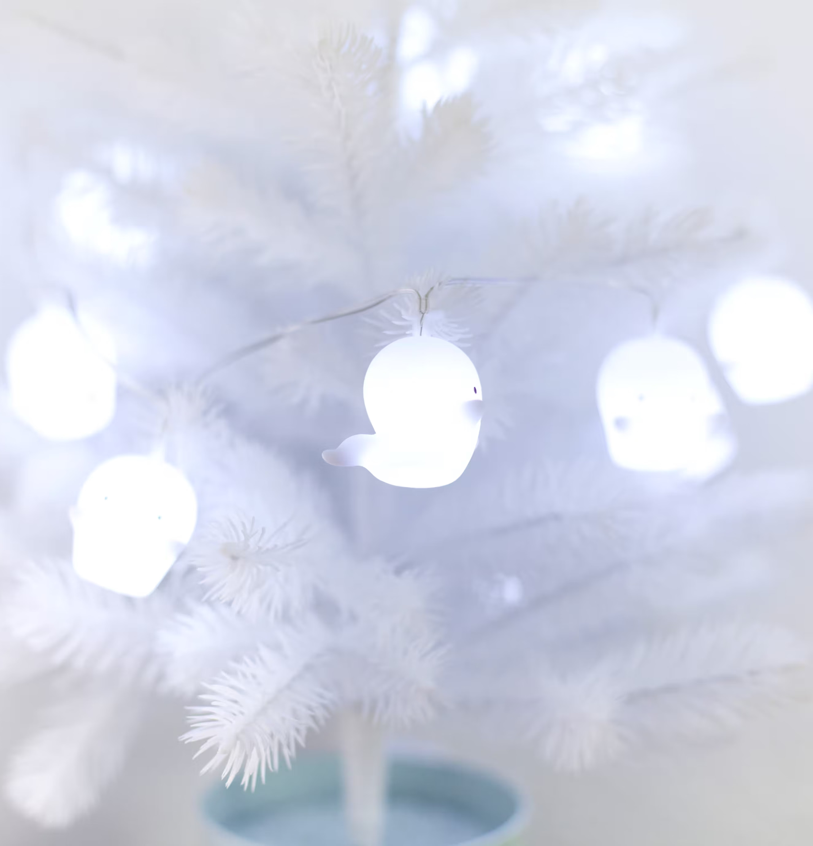 Ljusslinga Minispöken från A Little Lovely Company på vit gran