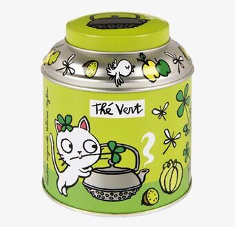 Foto av färgglad plåtburk med kattmotiv för teförvaring