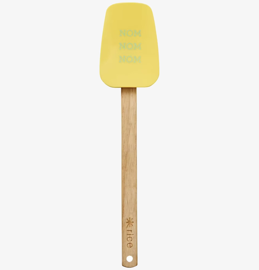 Slickepott Skålad Gul från Rice med texten NOM NOM NOM