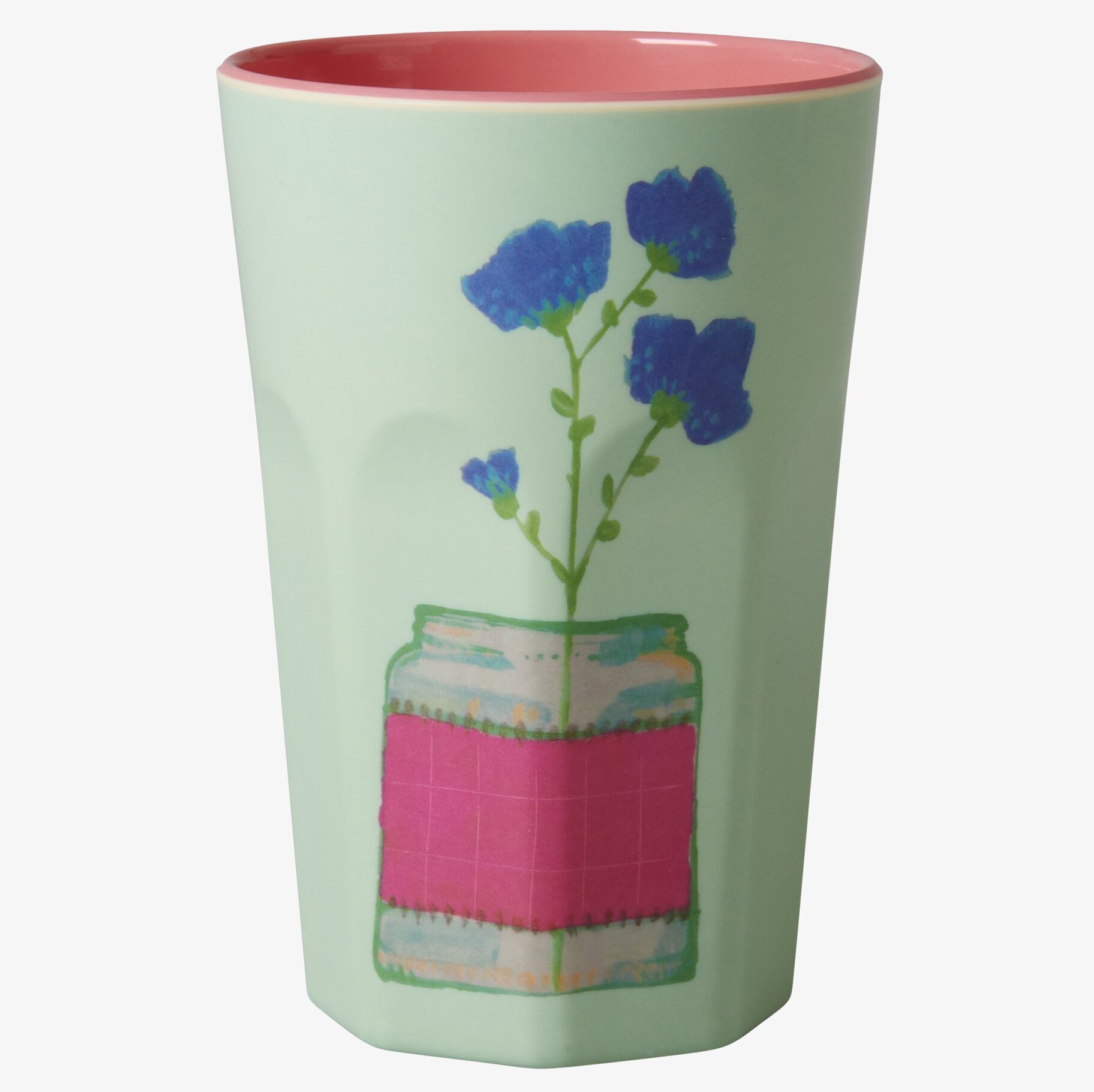 Bild av stilfull mugg med blommigt motiv och färgkontrast