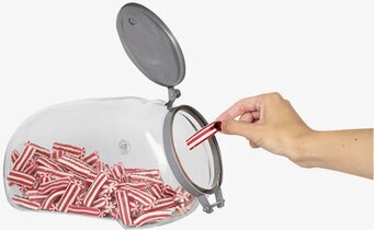 Bild av glasburk med lock och färgglada karameller