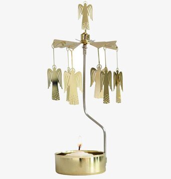 Bild av elegant ljusdekoration med roterande änglar