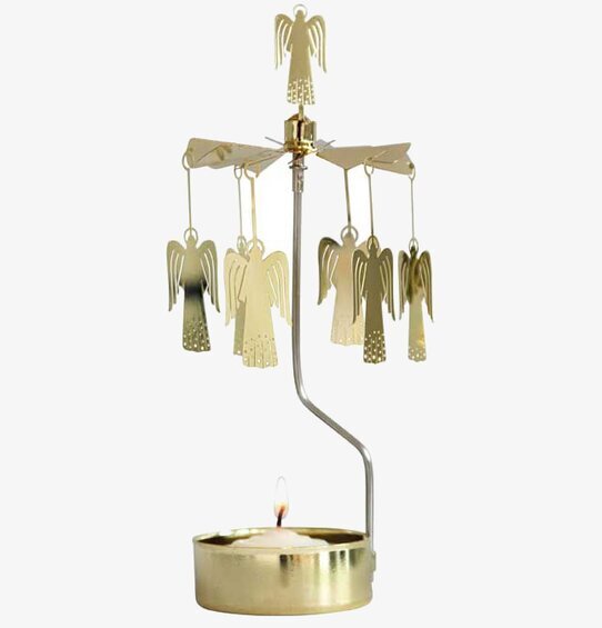 Bild av elegant ljusdekoration med roterande änglar