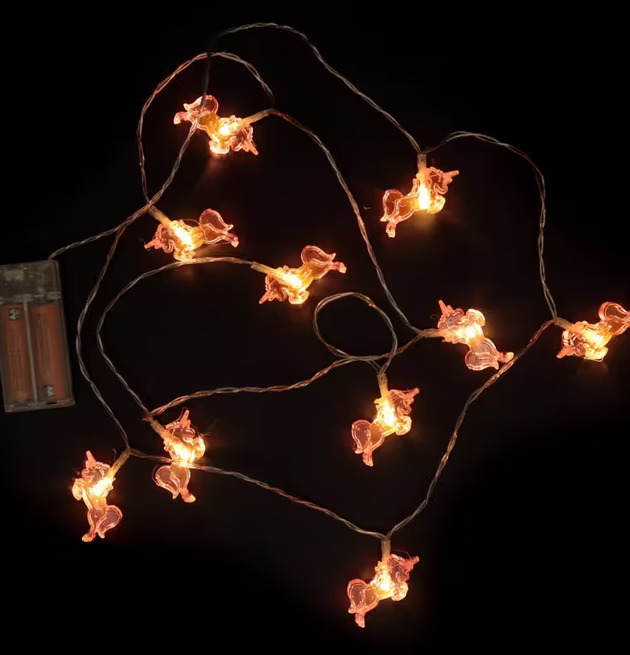 Enhörning LED Ljusslinga Rosa från Puckator på mörk yta