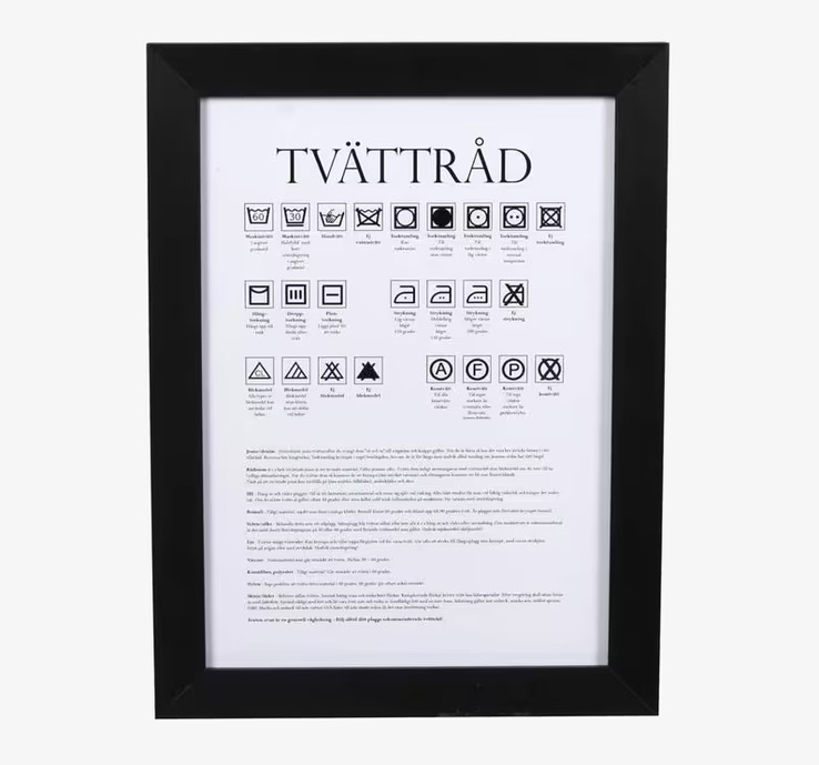 Tavla Tvättråd från Interstil med tvättsymboler och instruktioner