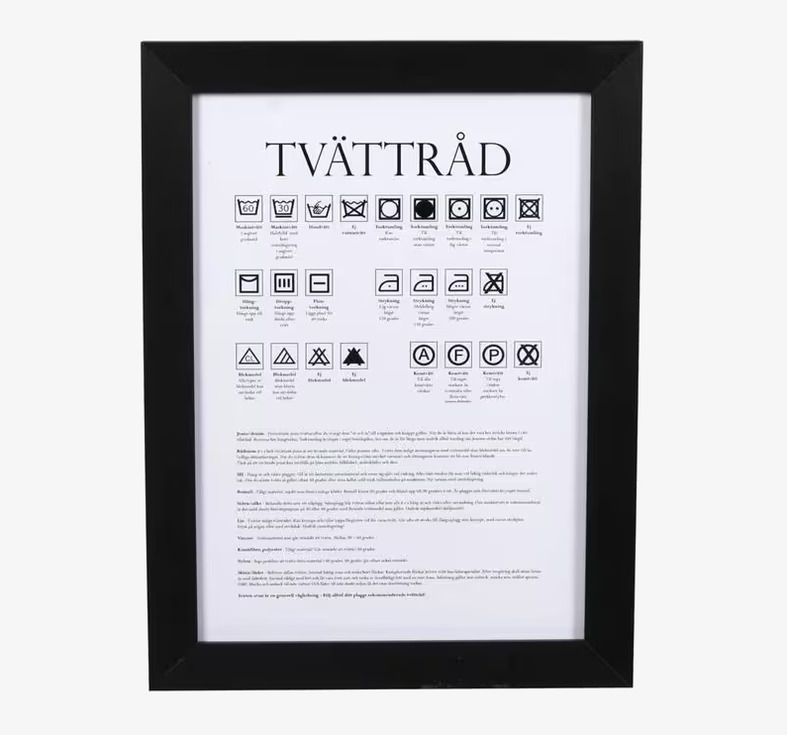 Tavla Tvättråd från Interstil med tvättsymboler och instruktioner
