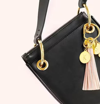 Reflextofs Aqua Deluxe från Firefly på svart handväska