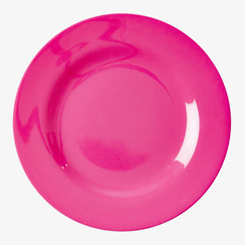 Assiett Neon Pink från Rice mot vit bakgrund, livfull färg