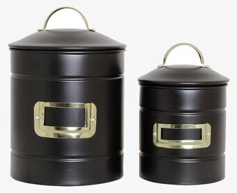 Bild av stilrena plåtburkar med mässingsdetaljer