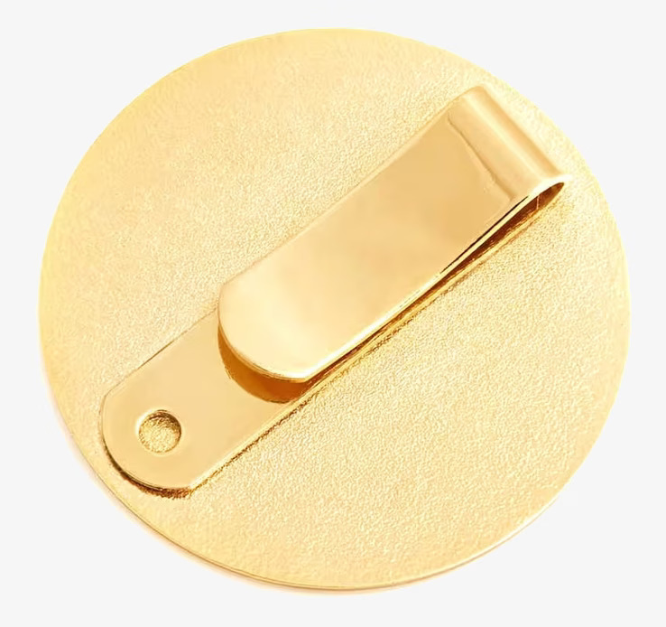 Reflexbrosch Guld Stenar från Firefly på neutral bakgrund