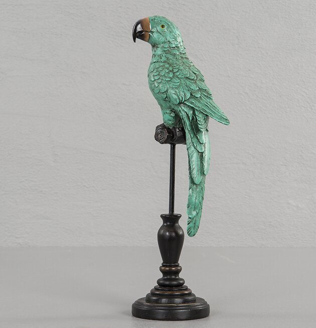 Papegoja Grön från A Lot Decoration på piedestal med detaljer