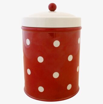 Foto av rödvit prickig plåtburk - stil och funktionalitet