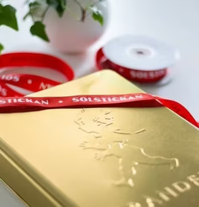 Brandfilt Guld från Solstickan med elegant design och logotyp