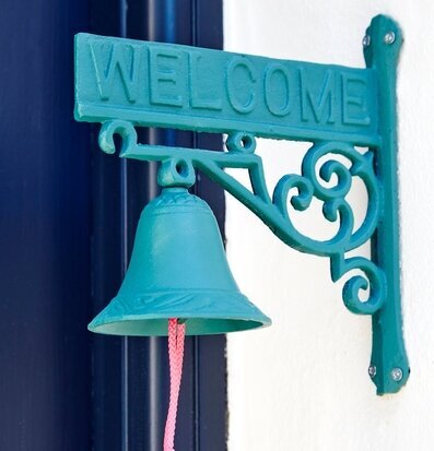 Dörrklocka Gul från Rice, turkos med präglad WELCOME-text
