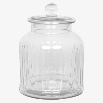 Bild av elegant glasburk med räfflad design och lock