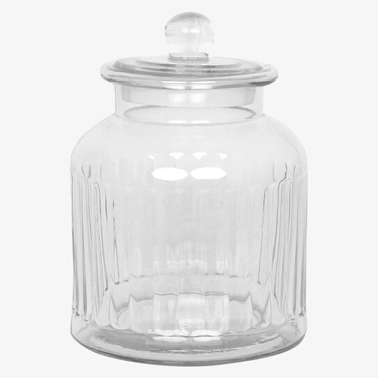 Bild av elegant glasburk med räfflad design och lock