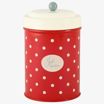 Bild av röd plåtburk med vita prickar för julgodis