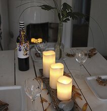 Vaxljus Silver 15 cm från Star Trading på rustik träbricka